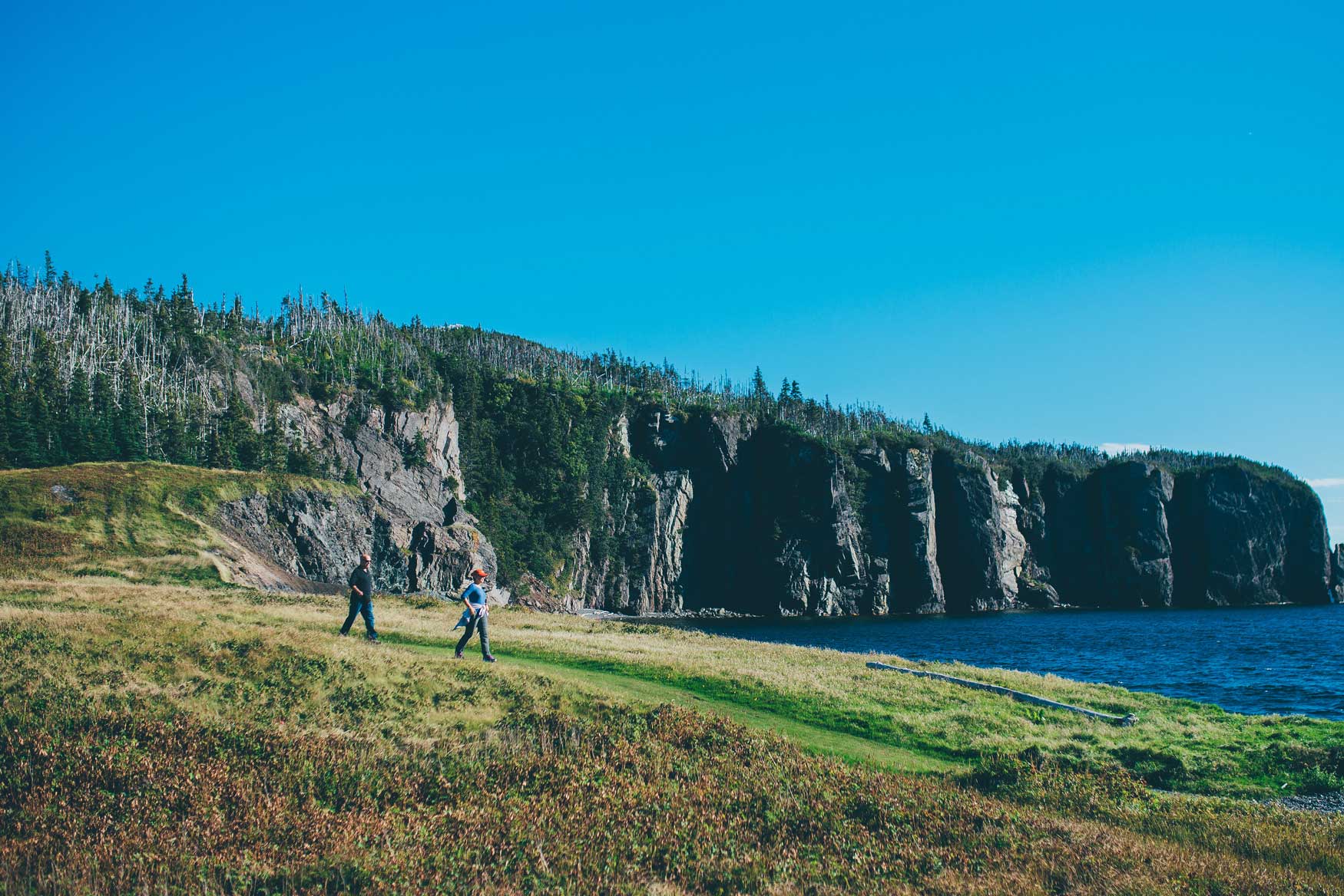 Two hikers walk the Skerwink Trail