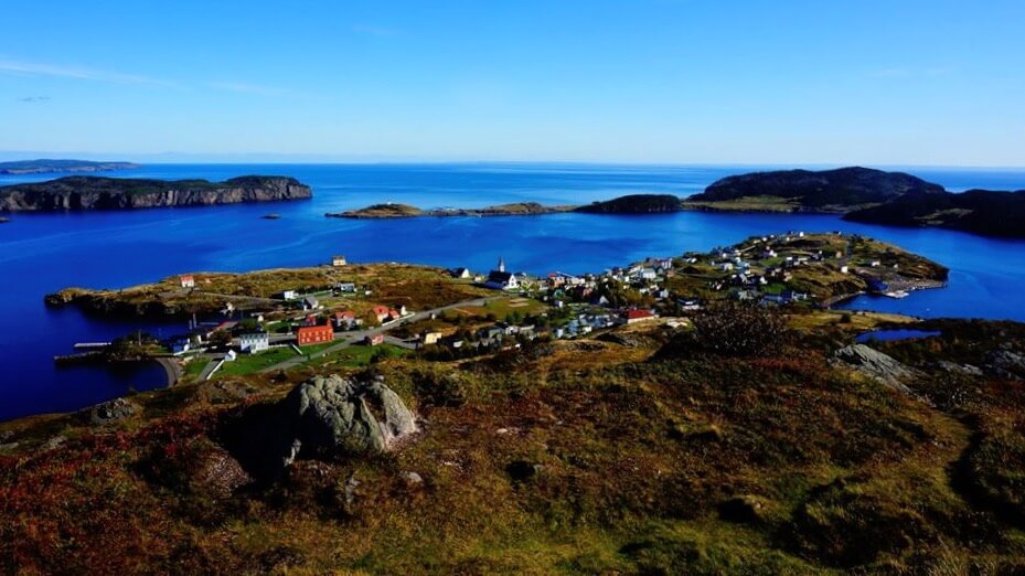 The view from the top of Gun Hill shows a whale tail shaped area of land surrounded by the Atlantic Ocean