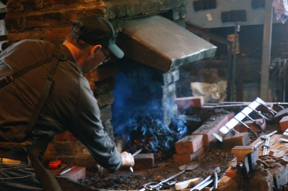 Blacksmith working at the forge